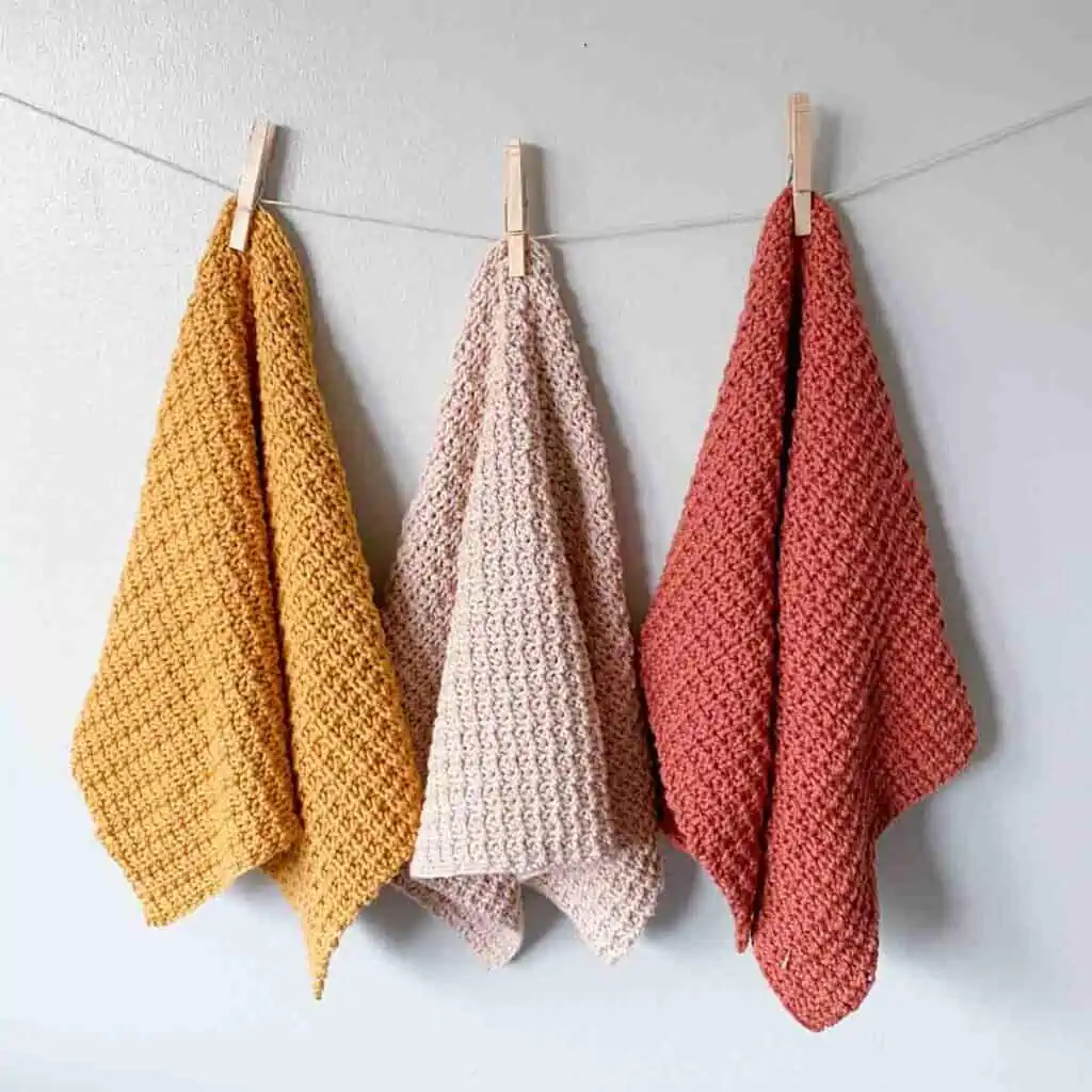 homemade crocheted hand towels in three colors