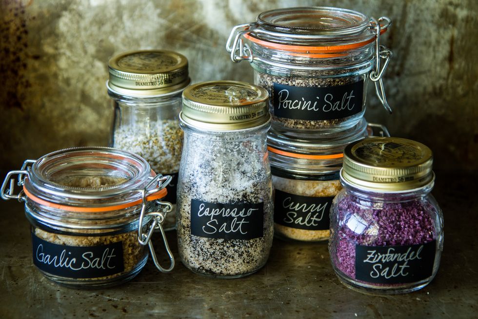 various homemade infused salts in jars